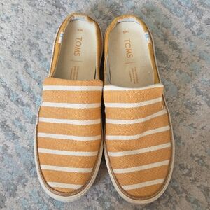 TOMS Yellow and Cream Striped Slip-On Shoes